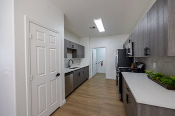 Espresso or sage custom cabinetry